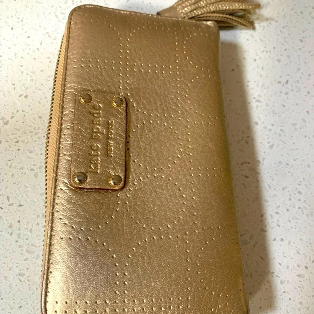 Kate Spade Metro Spade Neda Continental Zip Wallet in Gold